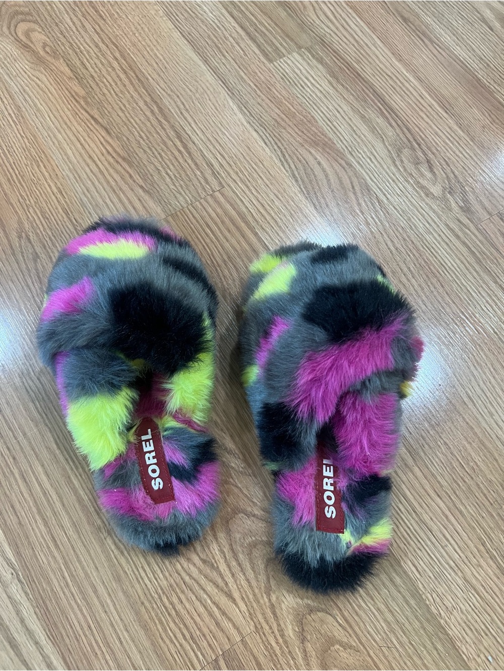 Sorel Faux-Fur Slide in Neon Pink with Yellow Accent. Gently used